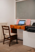 Minimal workspace with felt desk mat and keyboard