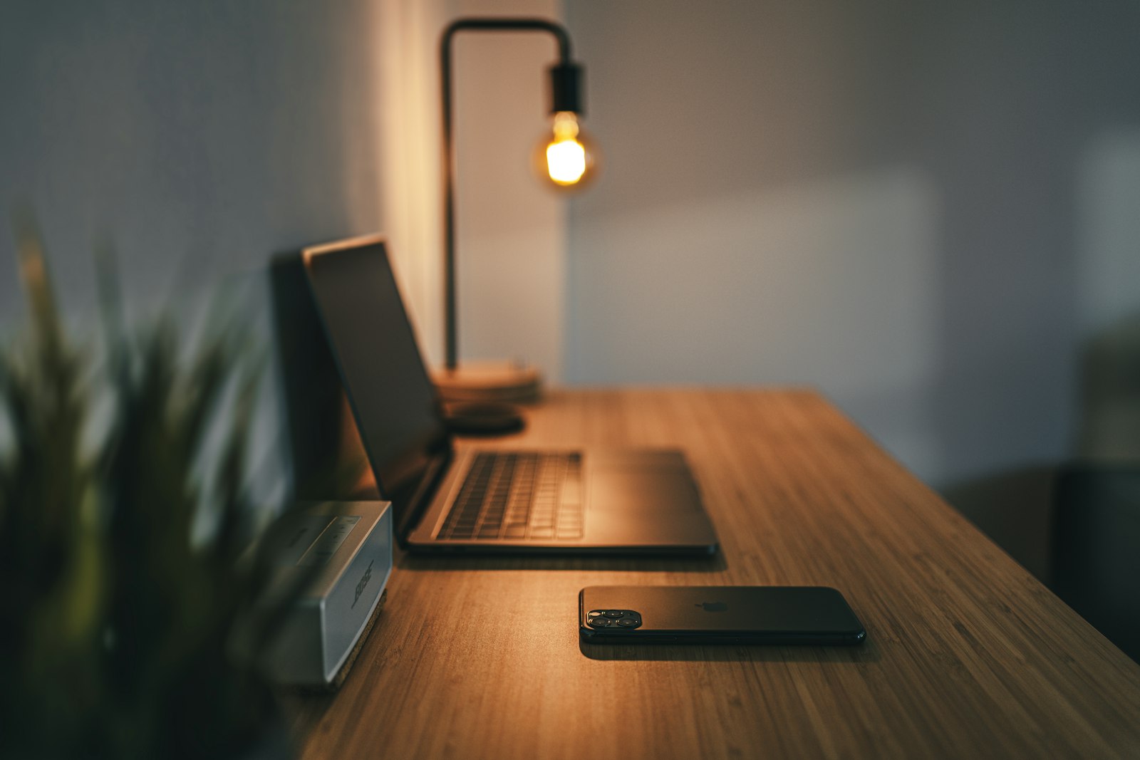 Laptop on a portable lap desk in a casual home setup