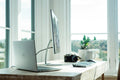 Modern monitor at a clean desk workspace
