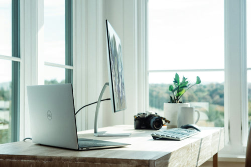 Modern monitor at a clean desk workspace